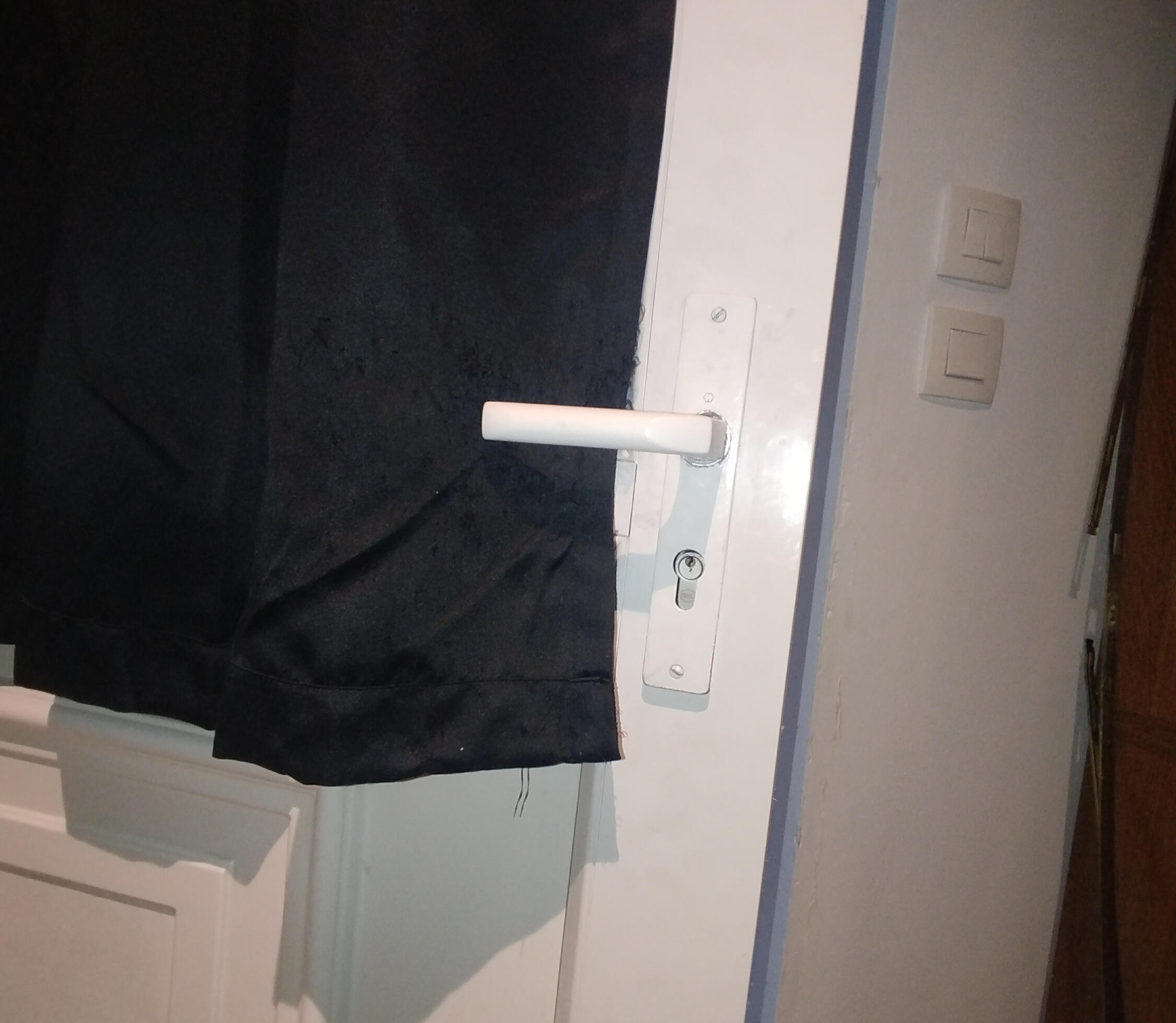 Poignée et serrure de porte après réparation par HomeQuali-T.